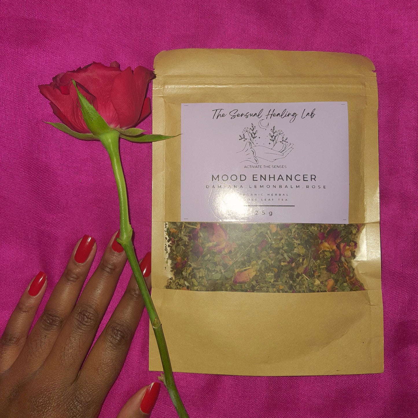 Mood enhancer herbal loose leaf tea blend combining dried damiana, lemon balm, and rose petals. This blend offers a delightful infusion that may uplift and brighten the spirit, providing a refreshing and flavorful way to enhance your mood