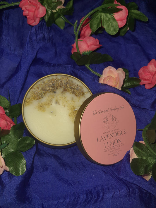 "Lavender and lemon soy wax candle adorned with dried lavender and chamomile herbs. The candle emits a soothing aroma, while the herbs add a natural touch of beauty and relaxation."