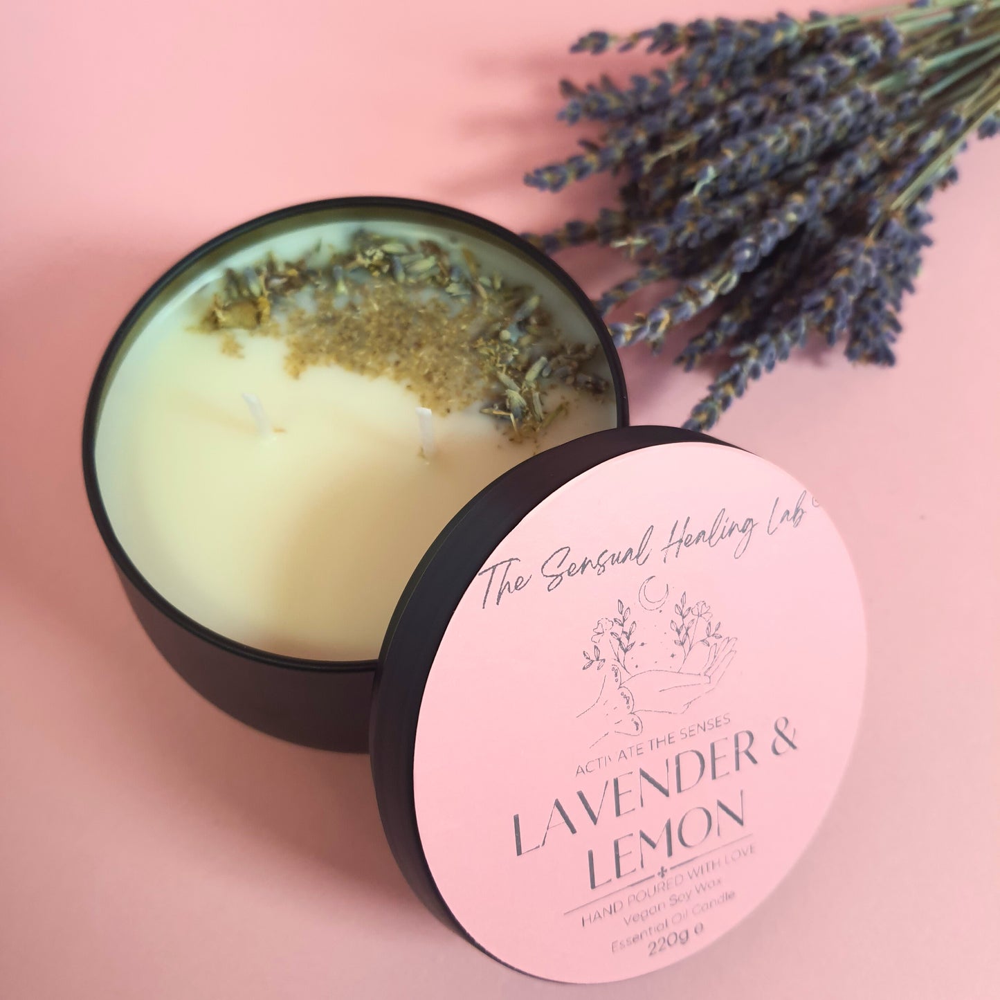 Lavender and lemon soy wax candle adorned with dried lavender and chamomile herbs. The candle emits a soothing aroma, while the herbs add a natural touch of beauty and relaxation.