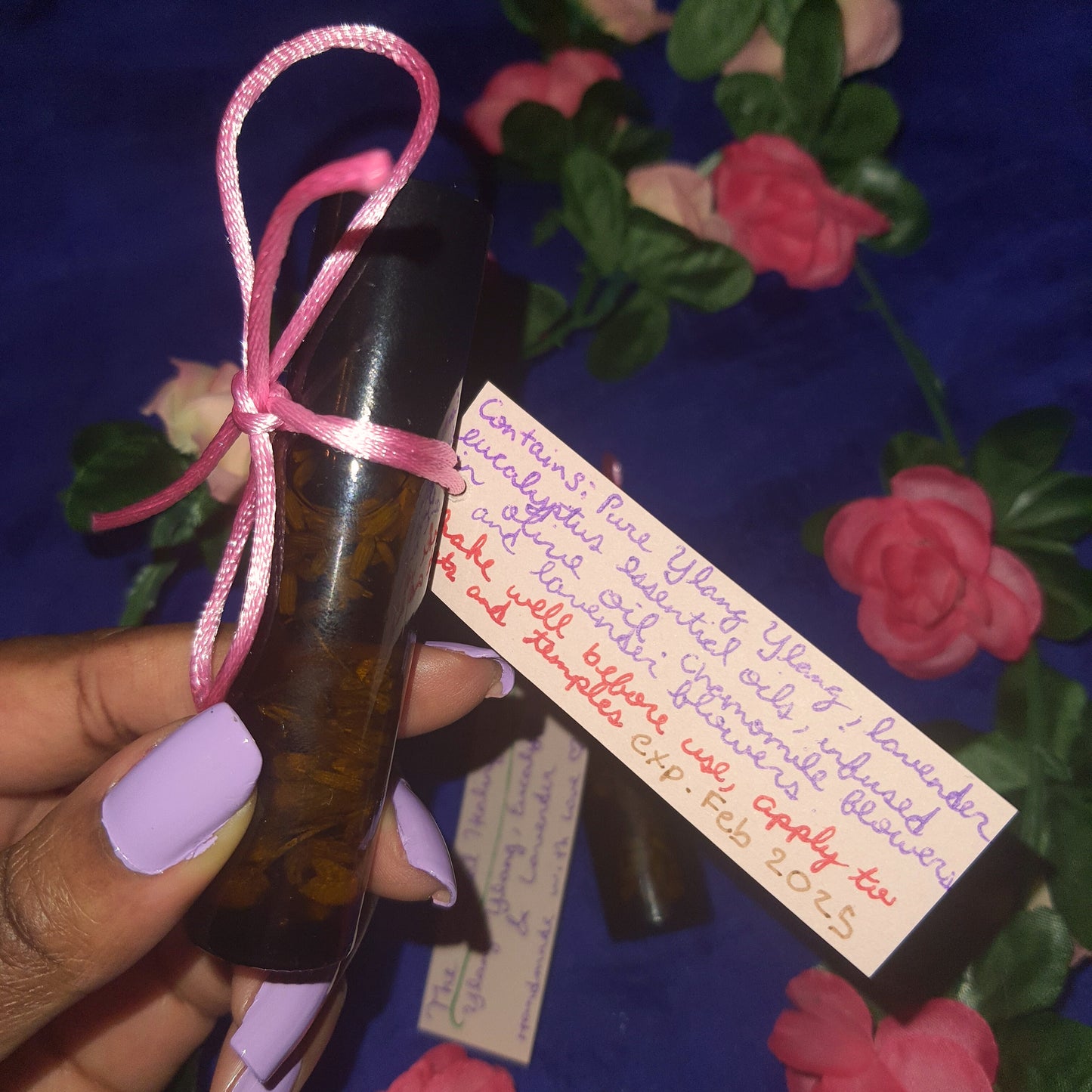 Relaxing essential oil roll-on infused with the calming scents of ylang ylang, lavender, and eucalyptus essential oils. The roll-on also features dried lavender and chamomile herbs, creating a serene and aromatic blend that can help ease tension and promote relaxation when applied.